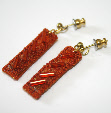 Orange drop earrings by textile artist Mary Taylor